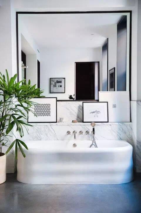 Leaning artwork in the bathroom of in your modular home