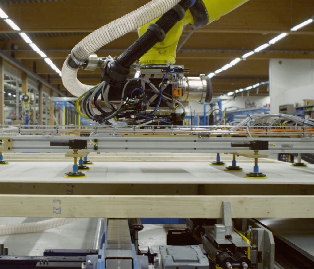 robot in factory picking up material